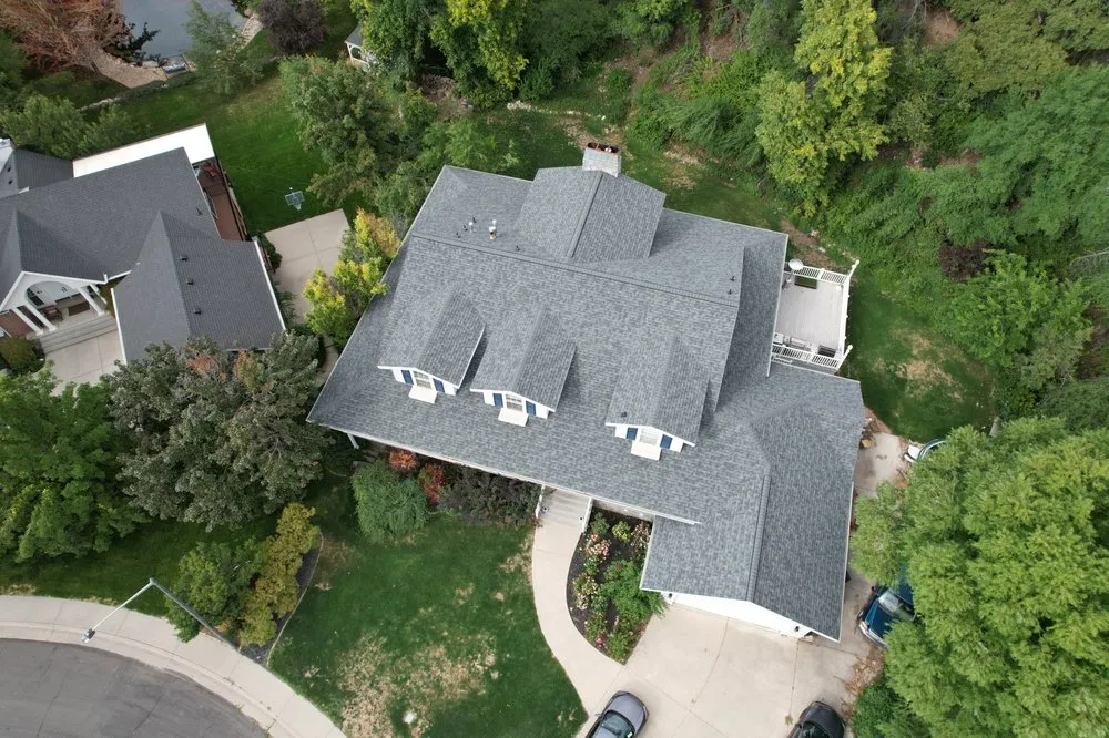 Slide of MTM Roofing