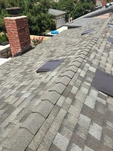 Slide of MTZ Roofing & Gutters