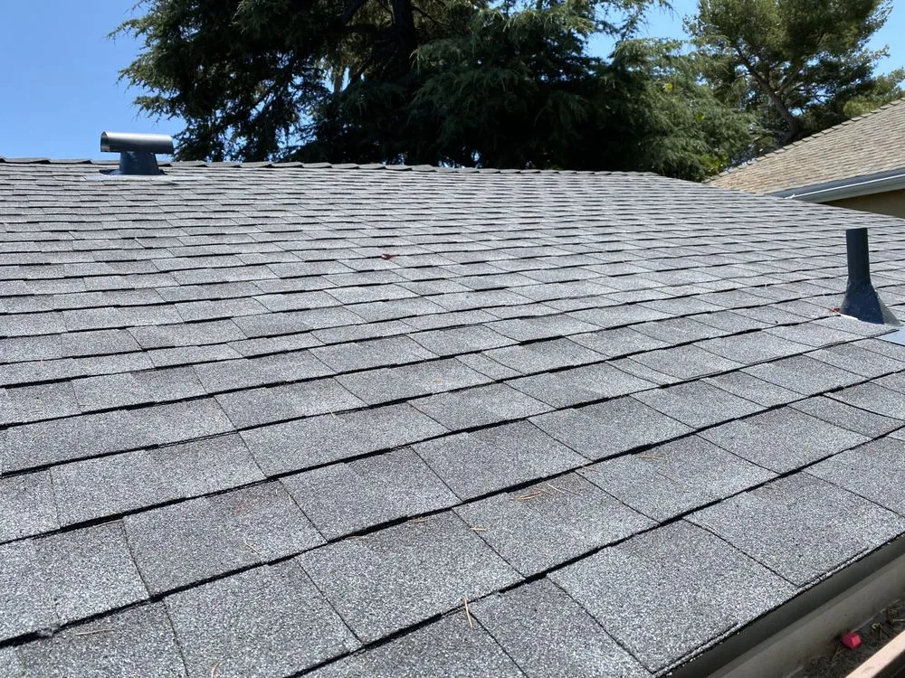 Slide of MTZ Roofing & Gutters