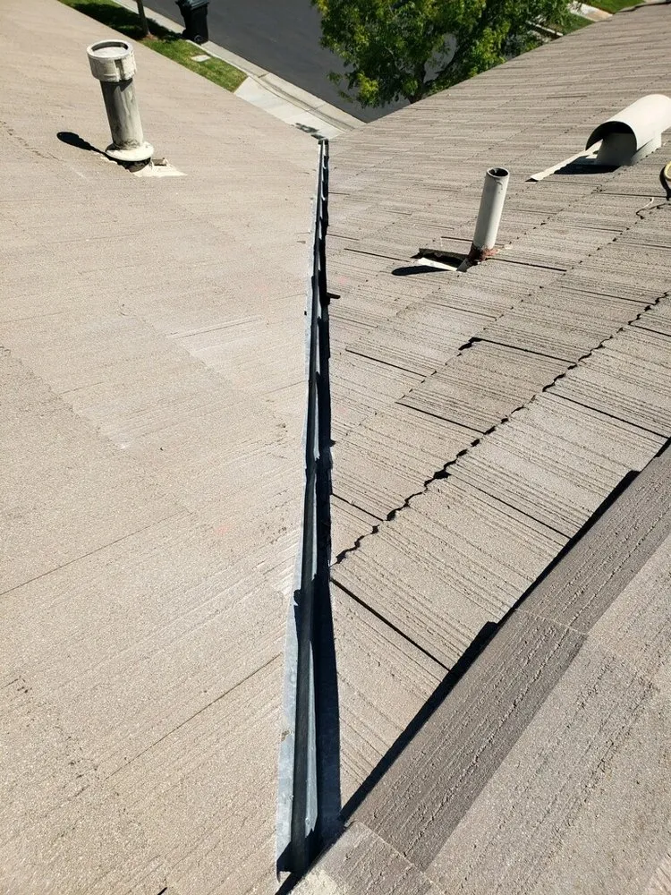 Slide of MTZ Roofing & Gutters