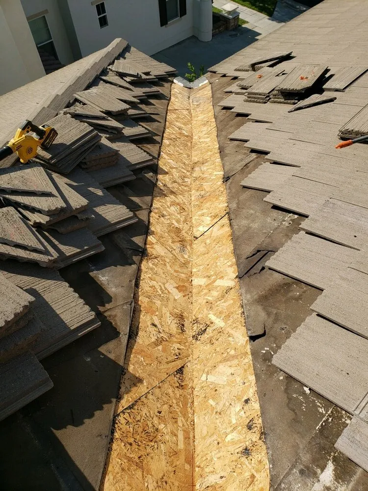 Slide of MTZ Roofing & Gutters