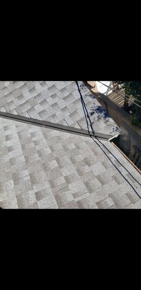 Slide of MTZ Roofing & Gutters