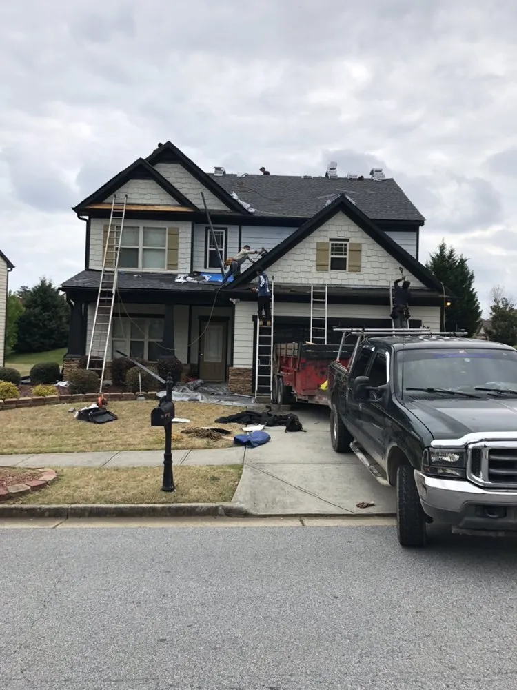 Slide of MTZ Roofing