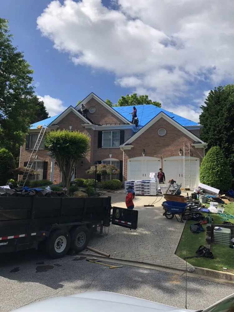 Slide of MTZ Roofing