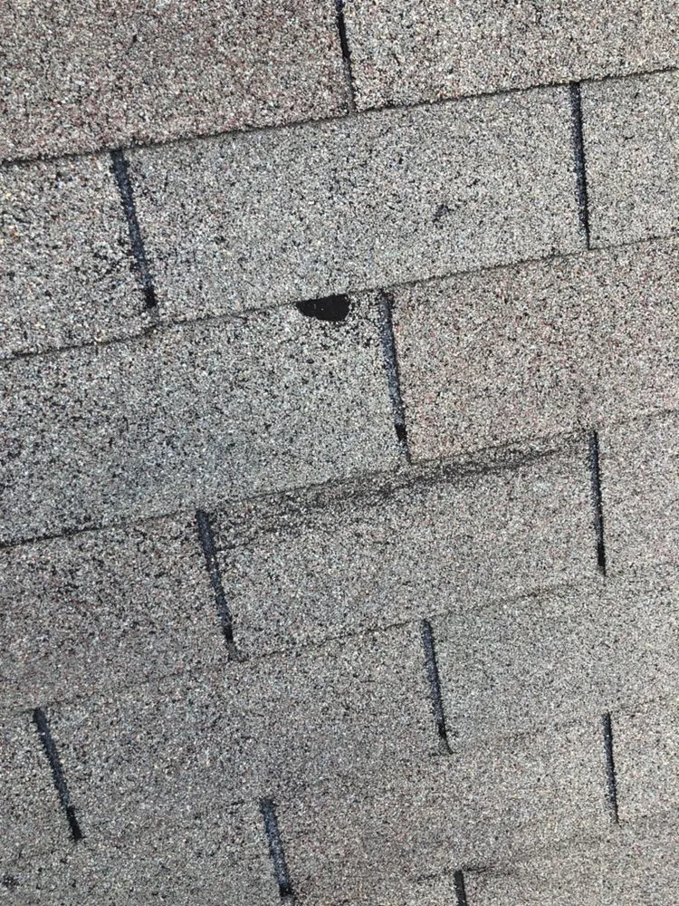 Slide of MTZ Roofing