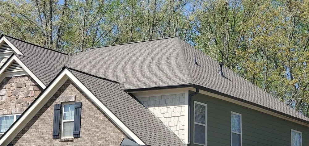 Slide of MTZ Roofing