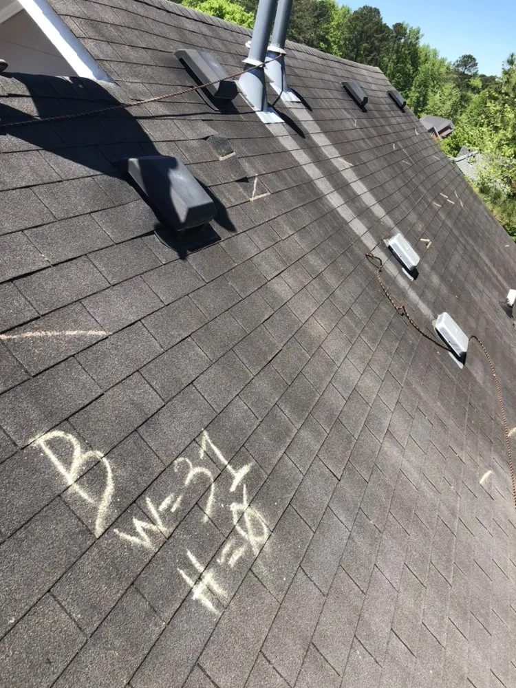 Slide of MTZ Roofing