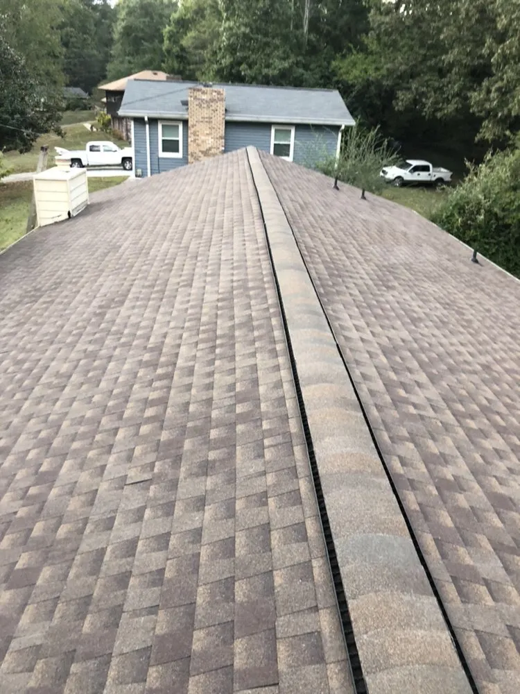 Slide of MTZ Roofing