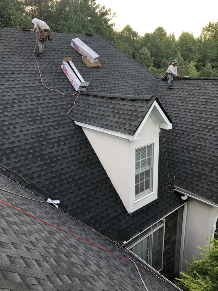 Slide of MTZ Roofing