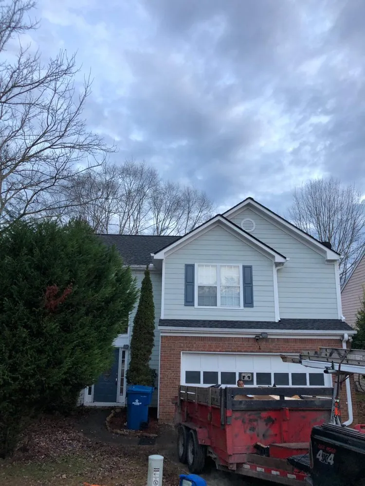 Slide of MTZ Roofing