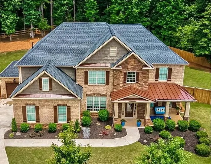 Slide of MTZ Roofing