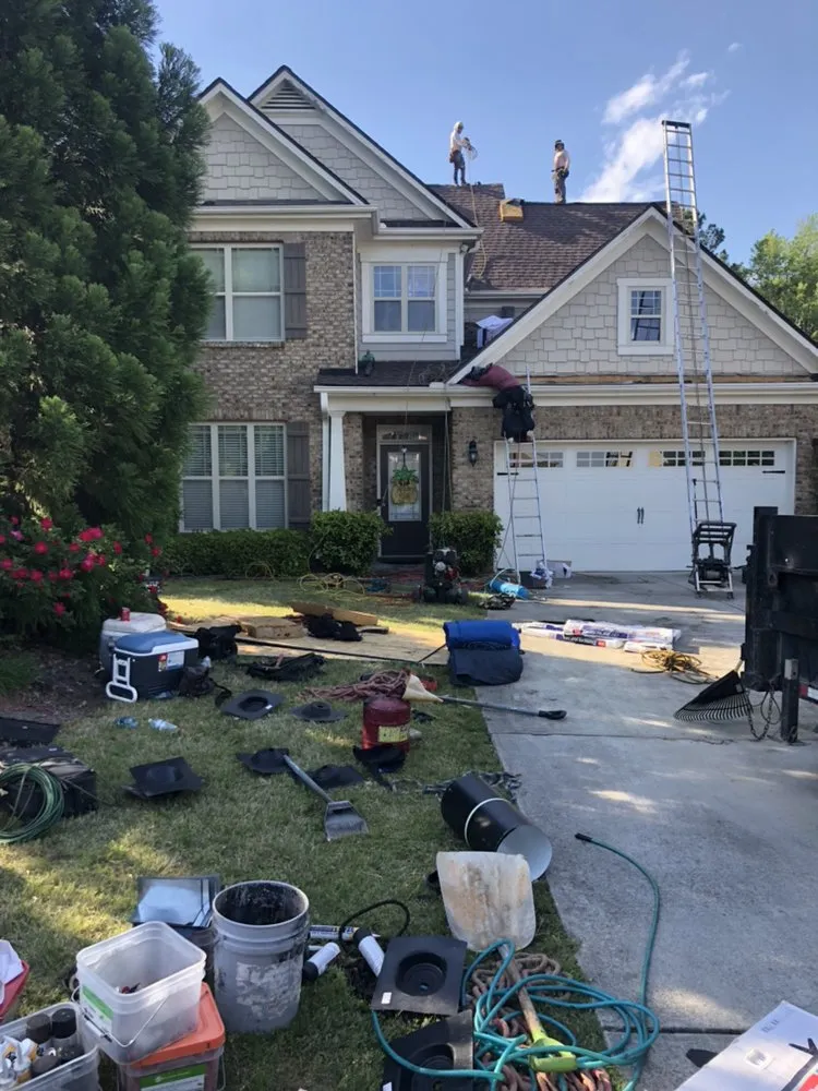 Slide of MTZ Roofing