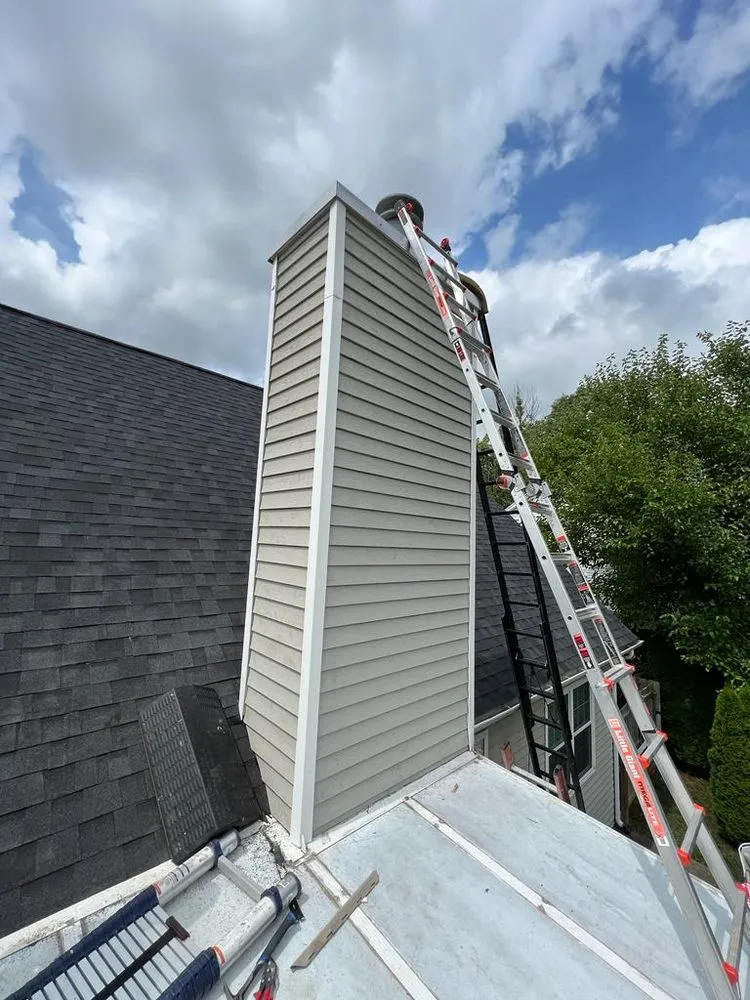 Slide of MU Roofing & Gutter