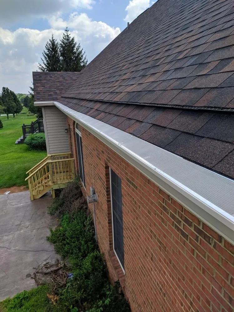 Slide of MU Roofing & Gutter