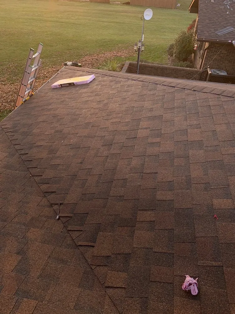 Slide of Mueller Roofing