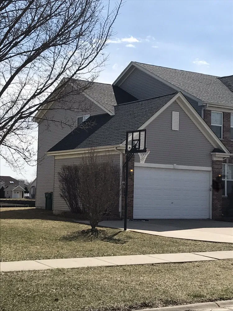 Slide of Mueller Roofing