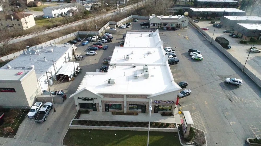 Slide of Mueller Roofing