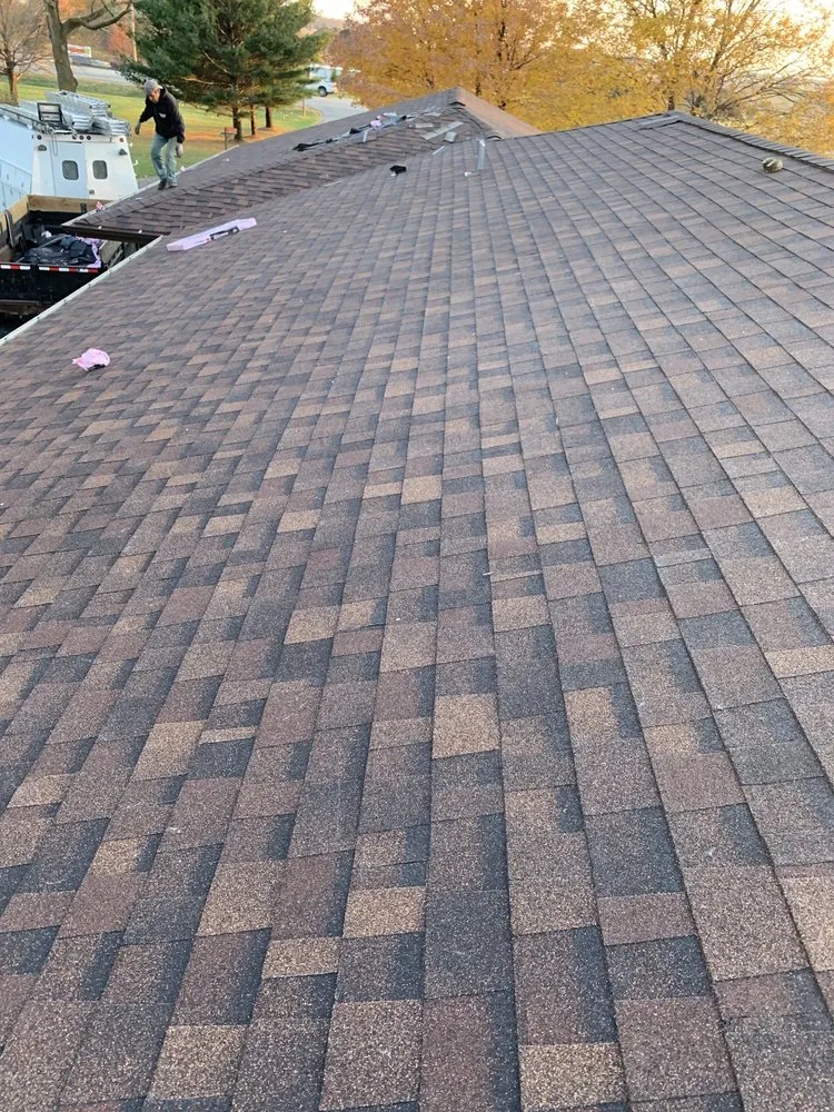 Slide of Mueller Roofing