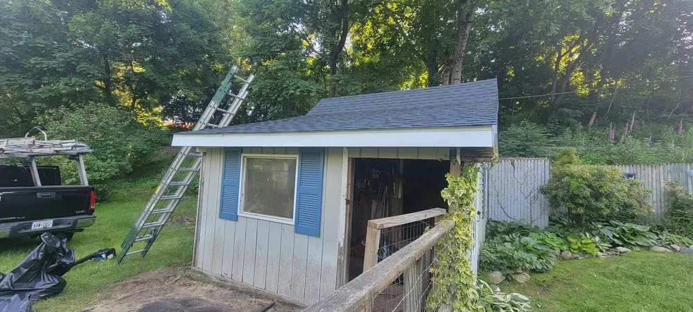 Slide of Muicela's Roofing