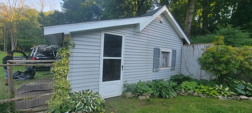 Slide of Muicela's Roofing