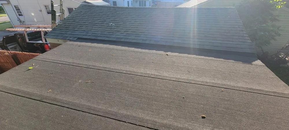 Slide of Muicela's Roofing