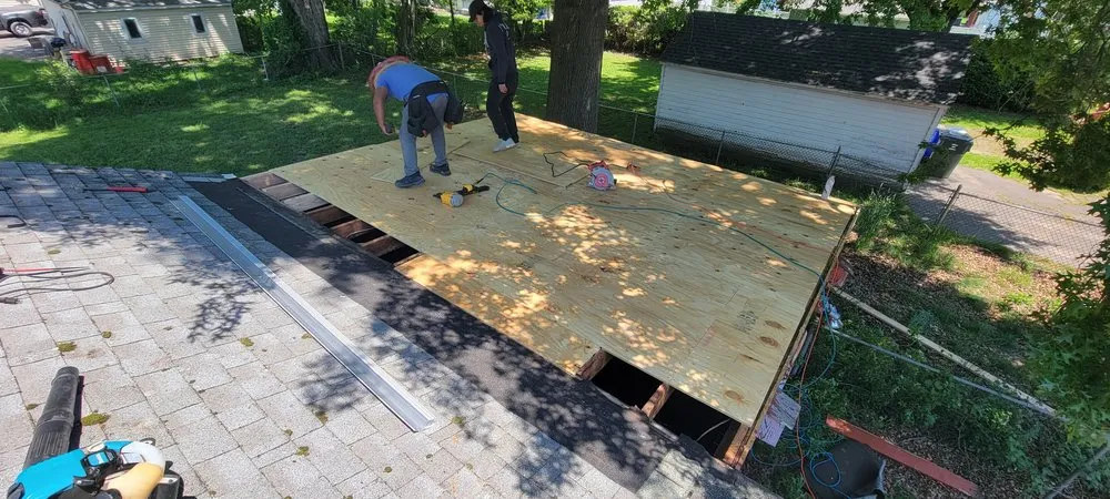 Slide of Muicela's Roofing