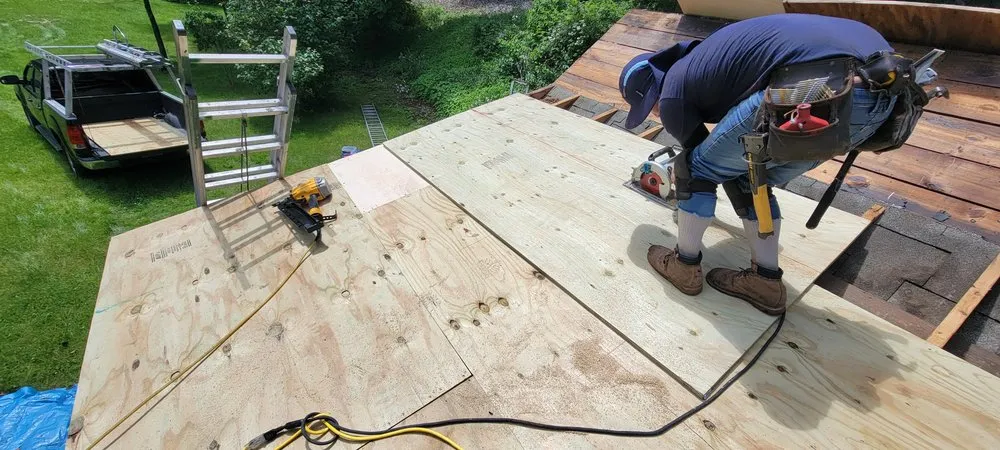 Slide of Muicela's Roofing