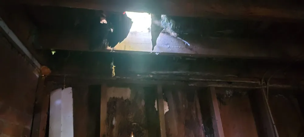 Slide of Muicela's Roofing