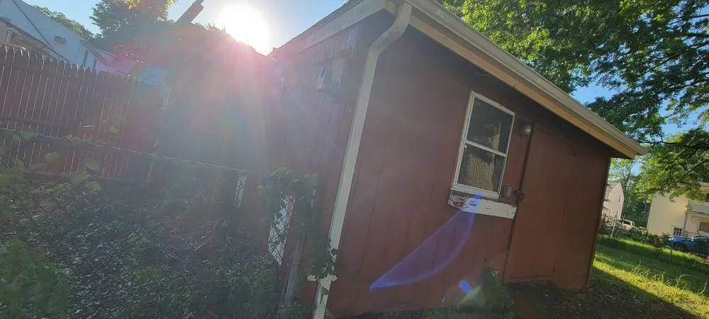 Slide of Muicela's Roofing