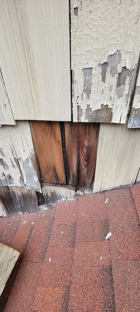 Slide of Muicela's Roofing