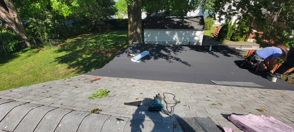 Slide of Muicela's Roofing