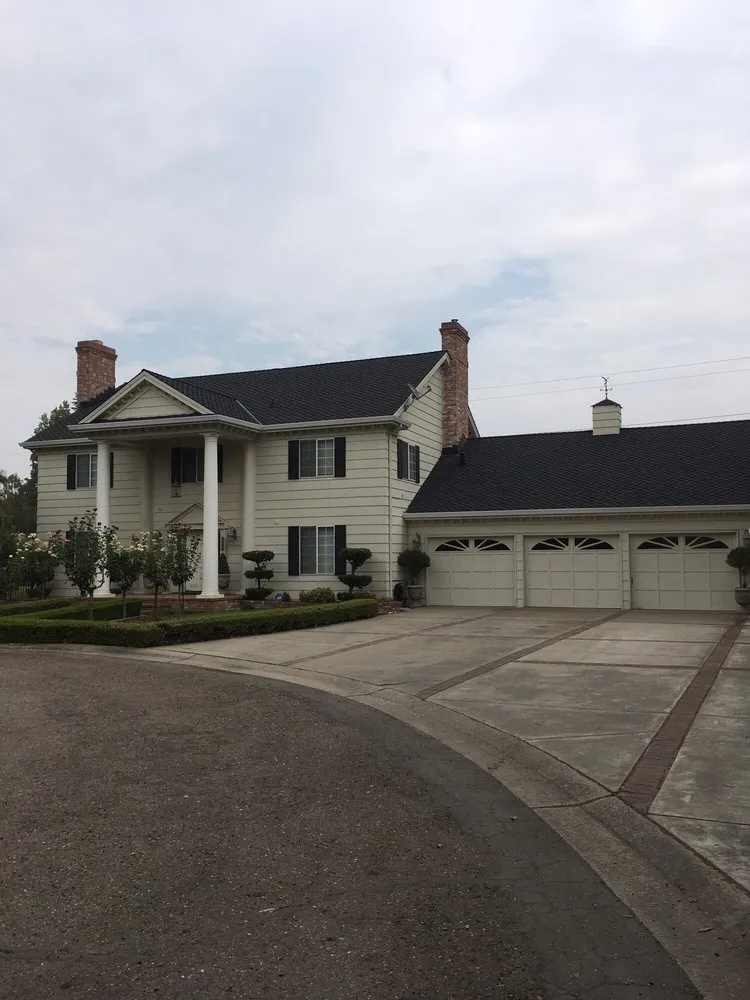 Slide of Munoz Roofing