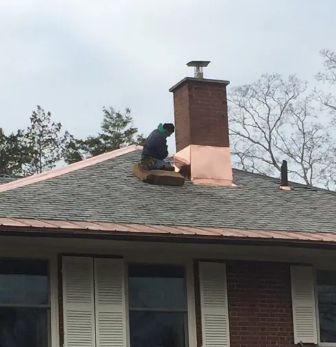 Slide of Munroe Roofing & Construction