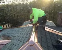 Slide of Munroe Roofing & Construction