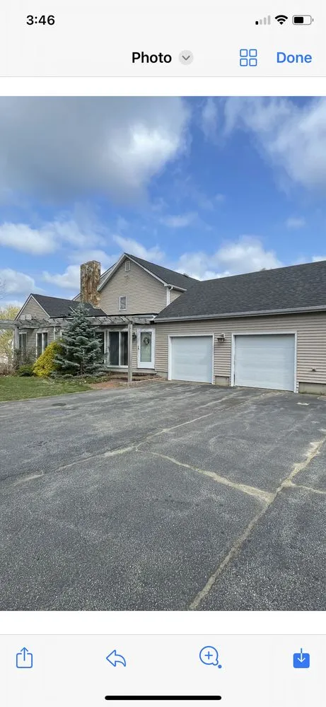 Slide of Munroe Roofing & Construction