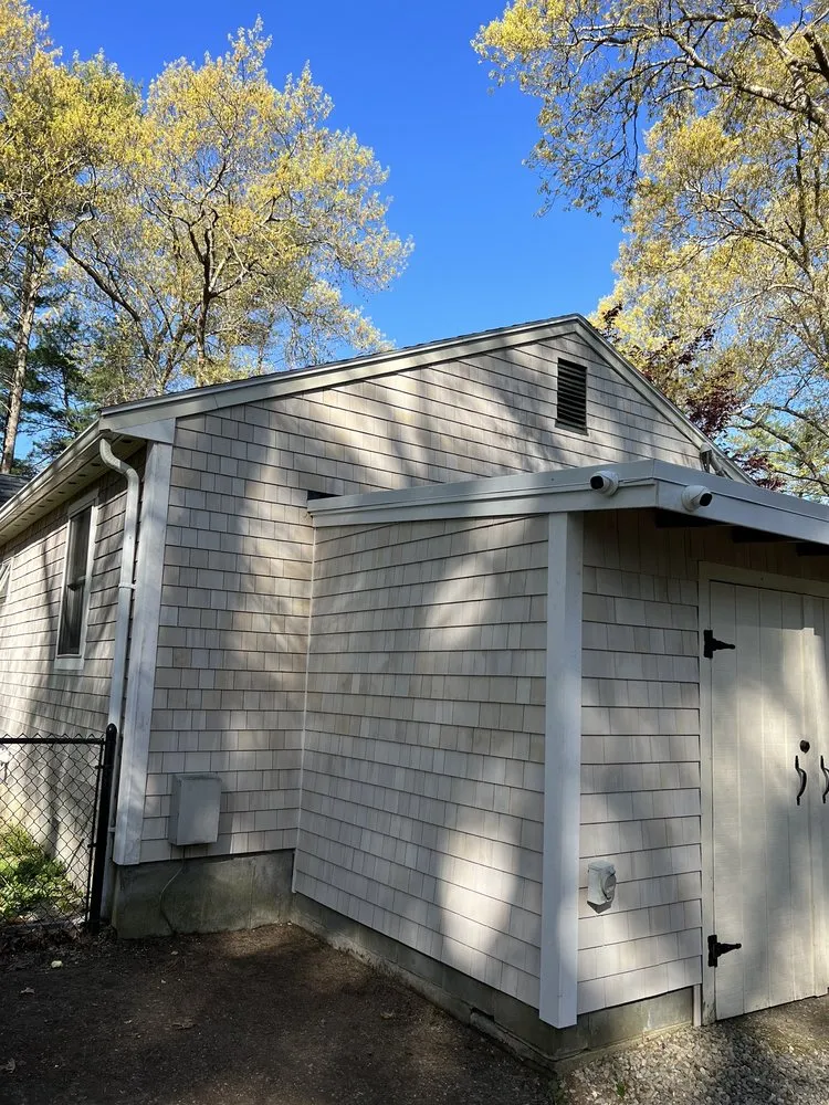 Slide of Munroe Roofing & Construction