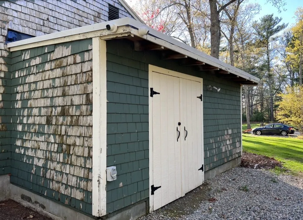Slide of Munroe Roofing & Construction