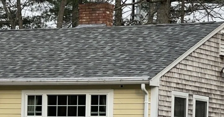 Slide of Munroe Roofing & Construction