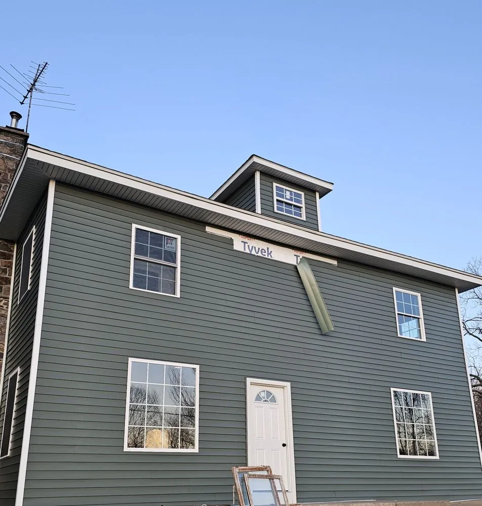 Slide of Munz Roofing & Siding