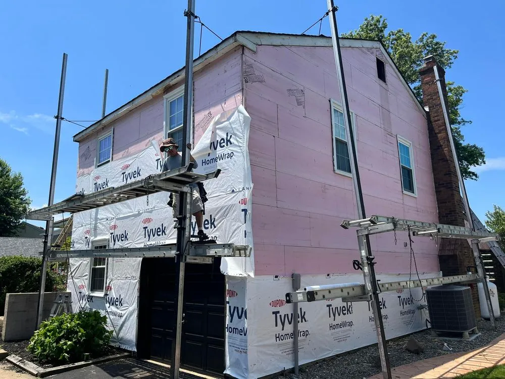 Slide of Munz Roofing & Siding