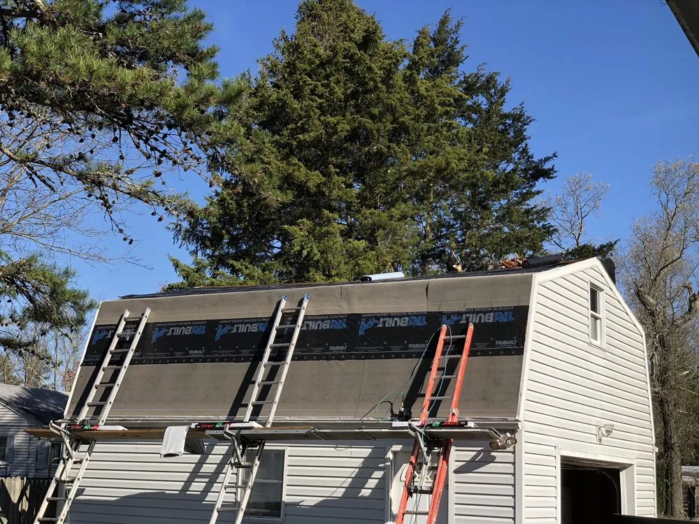 Slide of Munz Roofing & Siding