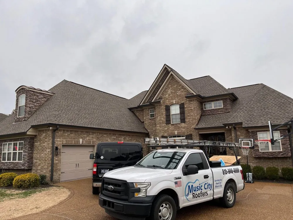Slide of Music City Roofers