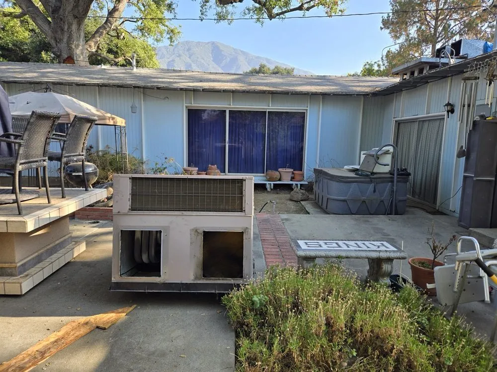 Slide of Musulman Roofing