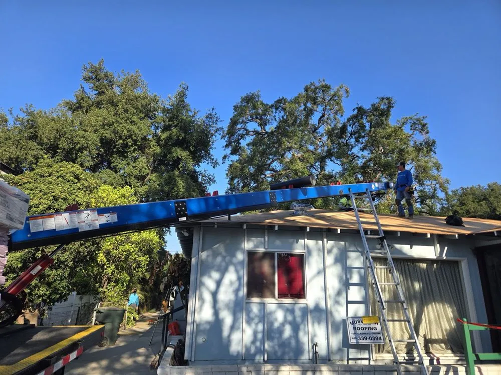 Slide of Musulman Roofing