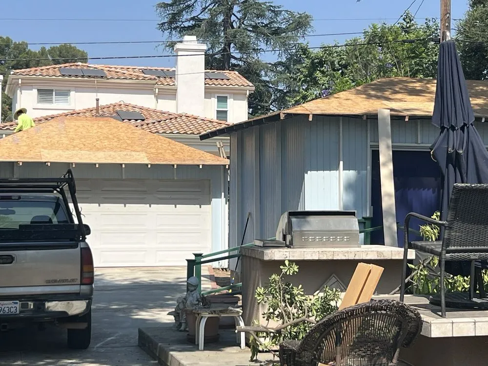 Slide of Musulman Roofing