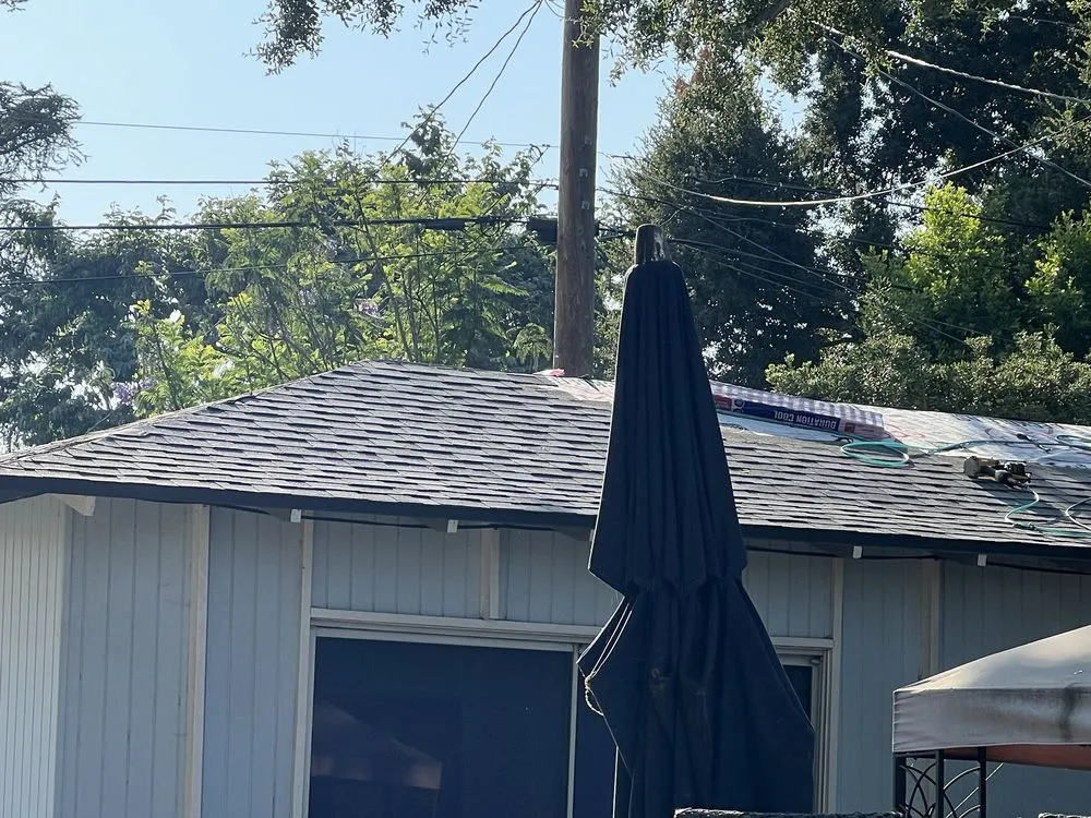 Slide of Musulman Roofing