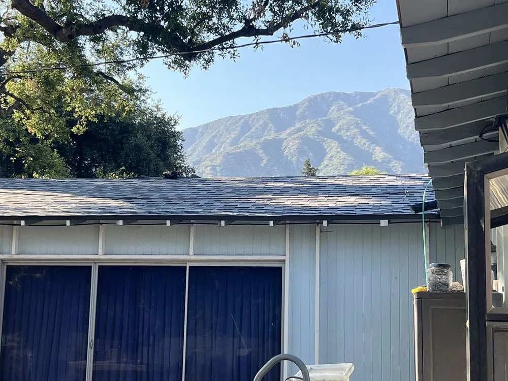 Slide of Musulman Roofing