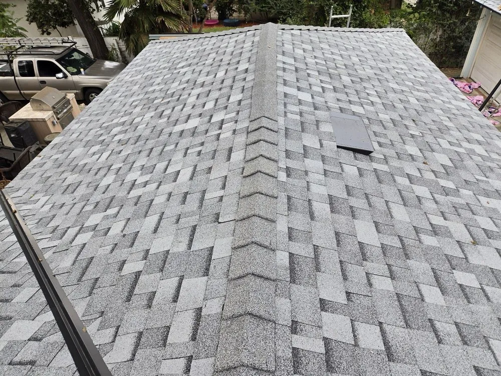 Slide of Musulman Roofing