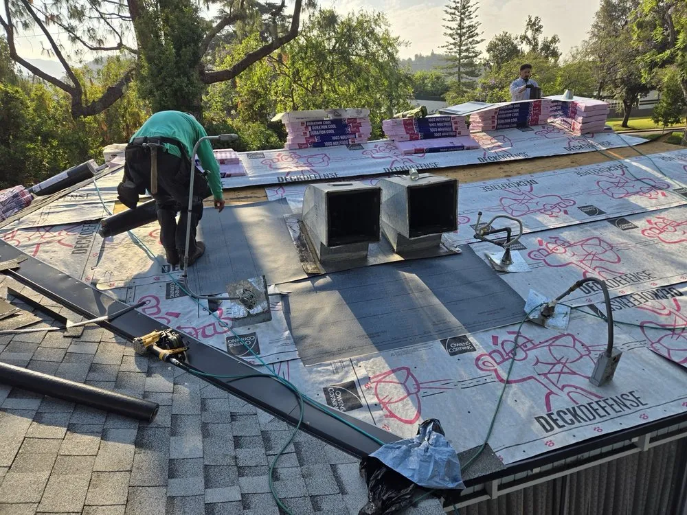 Slide of Musulman Roofing