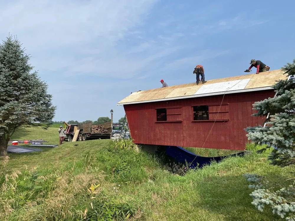 Slide of Muth & Company Roofing